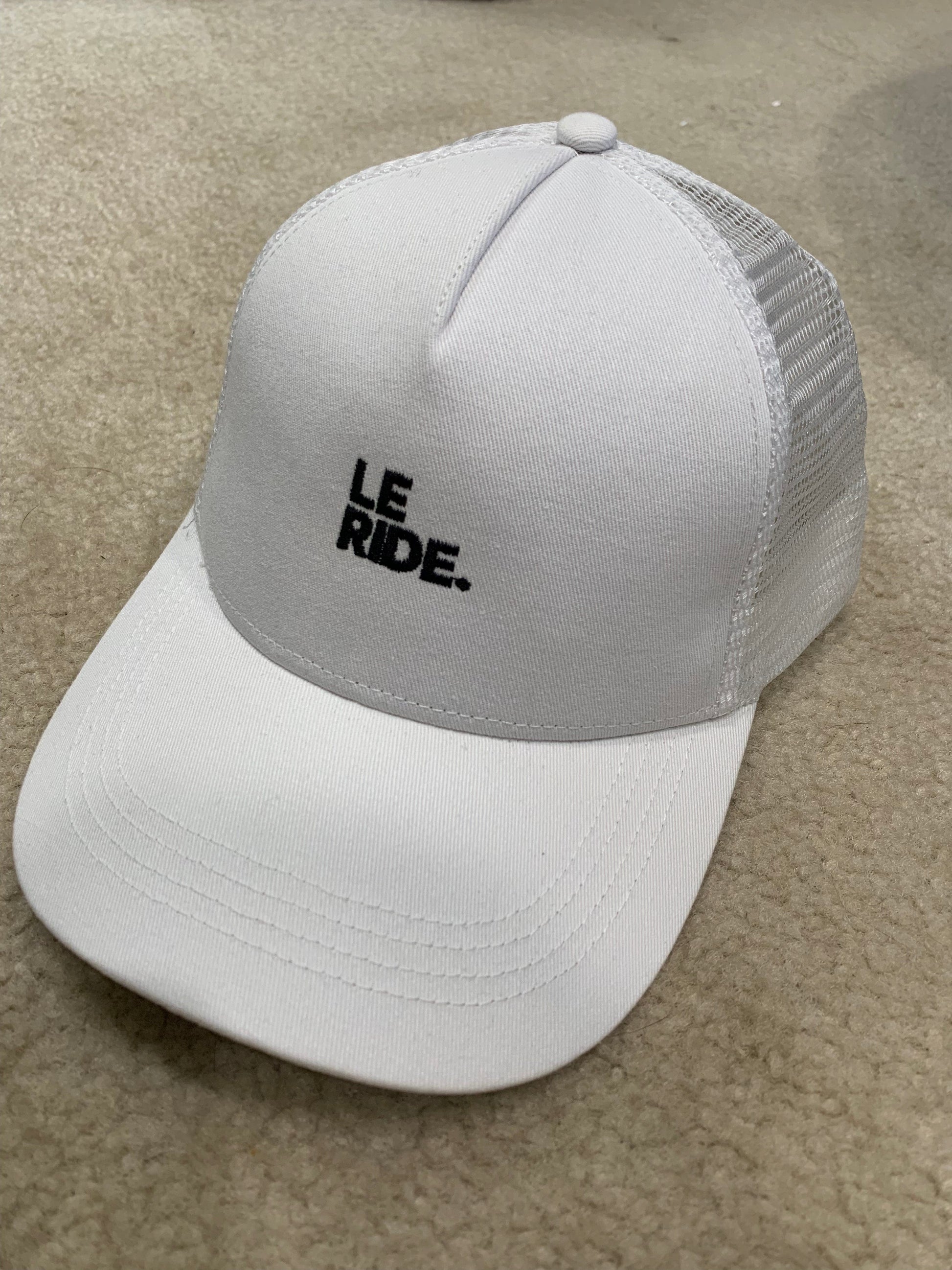 Equestrian Team Apparel Hats Le Ride. Trucker Cap Mesh Back White Mini Le Ride. equestrian team apparel online tack store mobile tack store custom farm apparel custom show stable clothing equestrian lifestyle horse show clothing riding clothes horses equestrian tack store